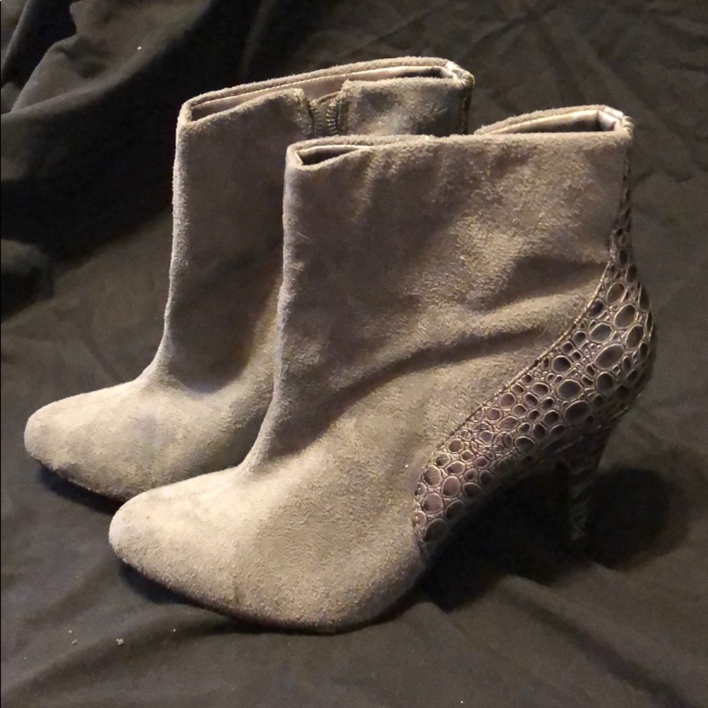 Grey suede zip-up booties with accented heel